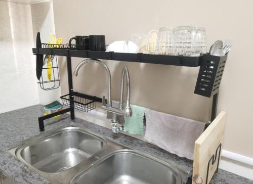 Η κουζίνα ή μικρή κουζίνα στο Shah Alam Homestay 7-10Pax