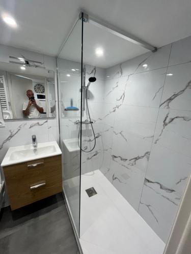 a bathroom with a shower and a sink at 18 m studio in Orelle 73140 in Orelle