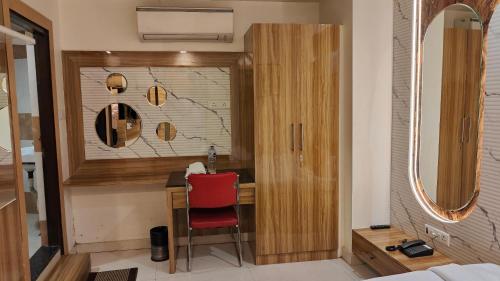Ένα ή περισσότερα κρεβάτια σε δωμάτιο στο Hotel Sapphire Inn