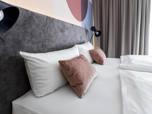 Mercure Mainz City Centerにあるベッド
