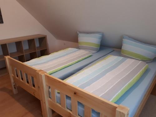 Postel nebo postele na pokoji v ubytování Monteurwohnung mit 3 Schlafzimmer Haus 9
