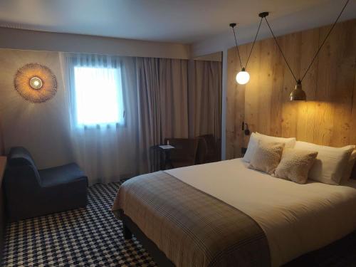 Postel nebo postele na pokoji v ubytování Mercure Peyragudes Loudenvielle Pyrénées