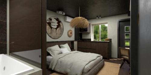 Katil atau katil-katil dalam bilik di Pavillon 15 Darcy - Appart-suites urbaines & design
