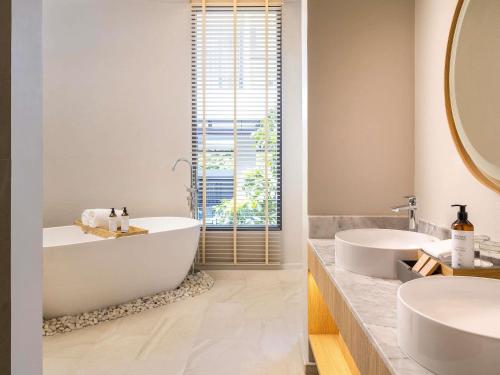 Vannituba majutusasutuses Mercure Rayong Lomtalay Villas & Resort