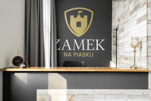 Un certificado, premio, letrero u otro documento en ZAMEK NA PIASKU - Tuż przy Plaży