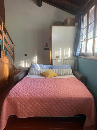 Postel nebo postele na pokoji v ubytování Casa Sperandini