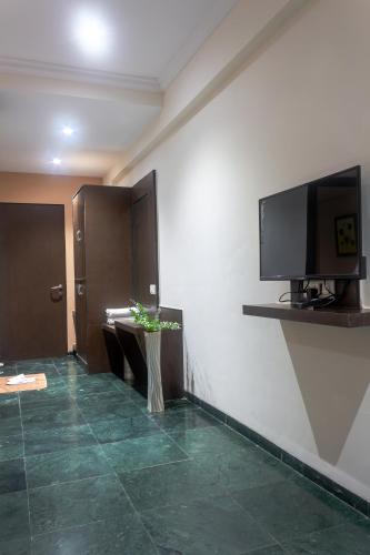 TV a/nebo společenská místnost v ubytování HOTEL KB's Grand