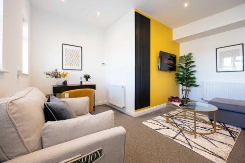 Χώρος καθιστικού στο Cosy apartment in the heart of Sale