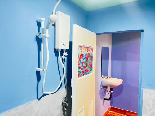 a bathroom with a shower and a sink at The Jungle Koh Rong in Koh Rong