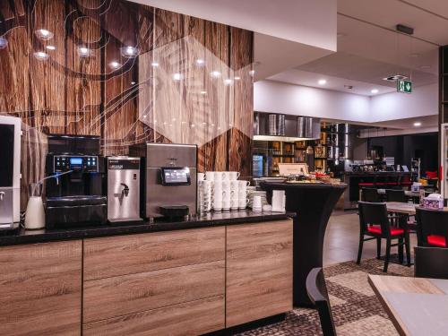 Kuchyň nebo kuchyňský kout v ubytování ibis Styles Nowy Sacz