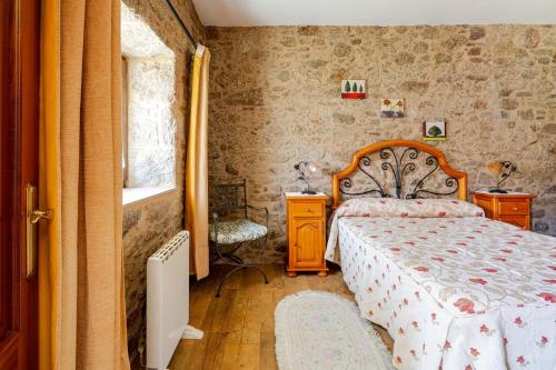 Ένα ή περισσότερα κρεβάτια σε δωμάτιο στο Cozy house in the countryside