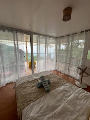 Katil atau katil-katil dalam bilik di Lunos hilltop Cabin