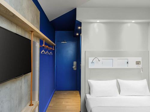 Кровать или кровати в номере ibis budget Amsterdam City South