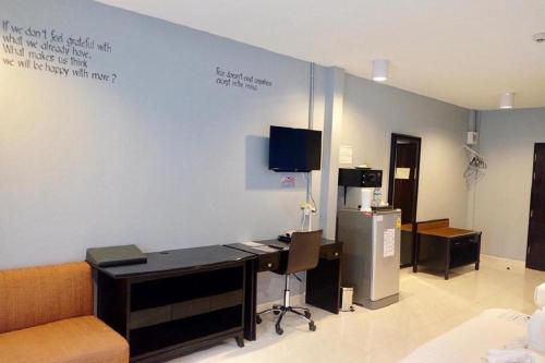 Télévision ou salle de divertissement dans l'établissement A2Sea Hotel