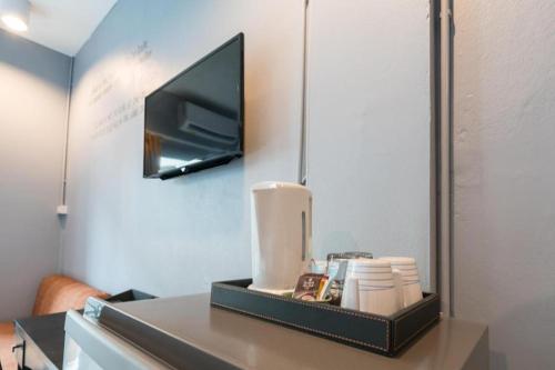 Télévision ou salle de divertissement dans l'établissement A2Sea Hotel