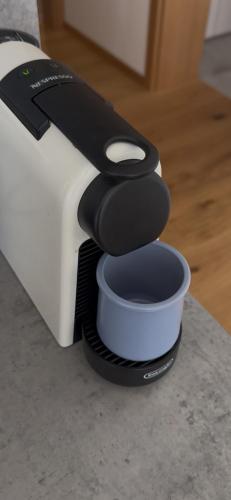 a close up of a toaster with a bowl at Elements Chopok in Bystrá