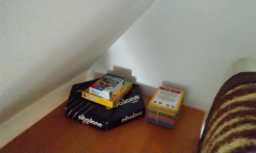 a table with two alarm clocks on top of it at Tarin zov in Kaludjerske Bare