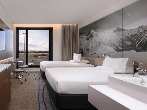 Katil atau katil-katil dalam bilik di Novotel Christchurch Airport
