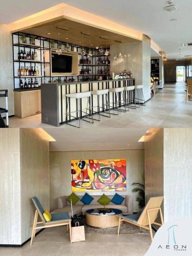 a lobby with a bar in a building at Aeon Tower Executive Suite in Davao City