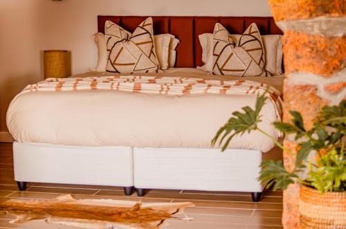 Katil atau katil-katil dalam bilik di Ikhaya Safari Lodge
