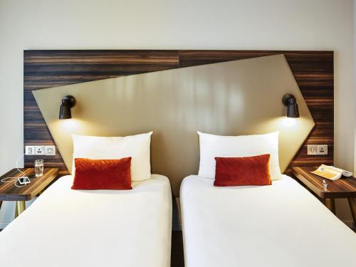 Voodi või voodid majutusasutuse Aparthotel Adagio Edinburgh Royal Mile toas