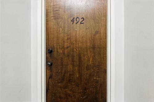 a wooden door with the number twentytwo on it at NEW LISTING The Classic City Collection - 3 Separate Units in Athens