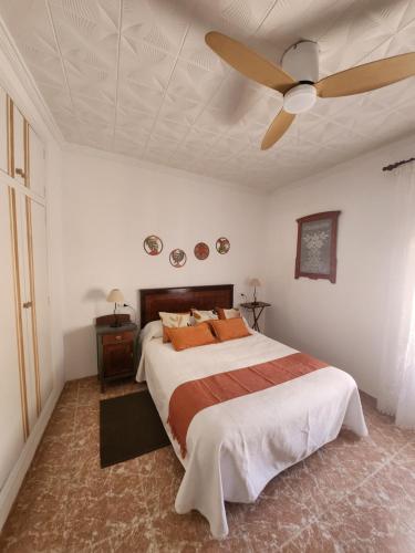 Ένα ή περισσότερα κρεβάτια σε δωμάτιο στο Casa Victoria i Ernesto