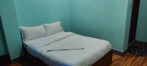 Llit o llits en una habitació de Kaphihomes