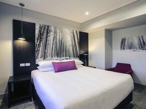 Ένα ή περισσότερα κρεβάτια σε δωμάτιο στο Mercure Tamworth