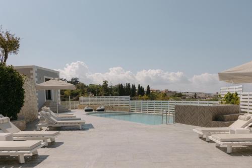 Πισίνα στο ή κοντά στο Olivia Villa, Celestial haven of luxury, By ThinkVilla