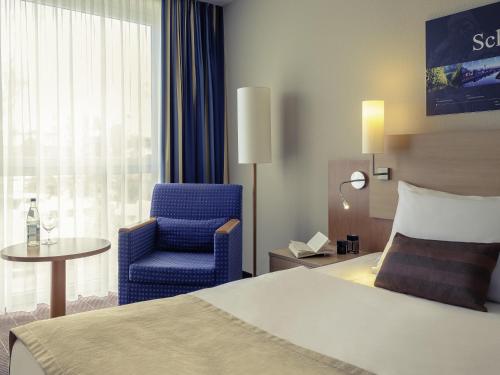 Mercure Hotel Schweinfurt Maininselにあるベッド