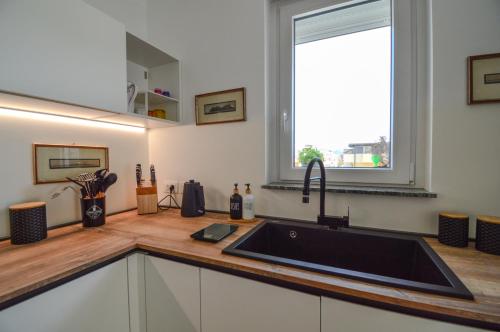 Kuchyň nebo kuchyňský kout v ubytování 60 passi dal mare-Charming CdO