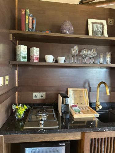 Kuchyň nebo kuchyňský kout v ubytování Yamu Lifestyle Resort