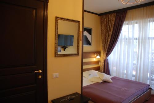 Ένα ή περισσότερα κρεβάτια σε δωμάτιο στο Chalet Zolota Pidkova & River