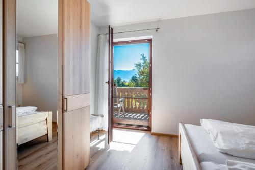 Una cama o camas en una habitación de Wohnung Untersbergblick
