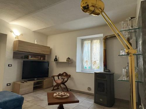 TV a/nebo společenská místnost v ubytování Pontinvrea