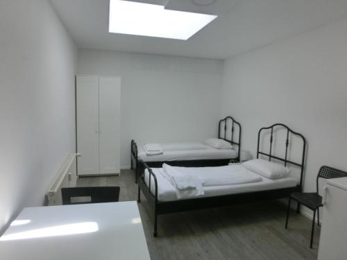Ένα ή περισσότερα κρεβάτια σε δωμάτιο στο Hotel Rahlau