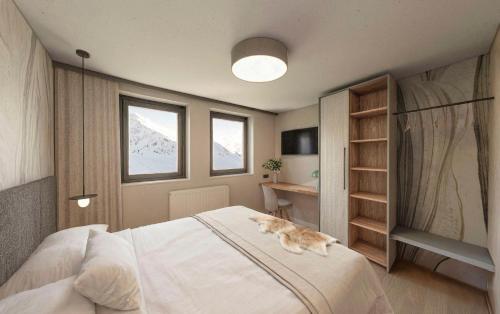a dog laying on a bed in a bedroom at Carpe Solem Kaprun 4 star superior Hotel by ALPS RESORTS in Kaprun