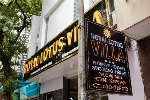 a sign for a royal louis villeille restaurant at Royal Lotus Hotel in Hanoi