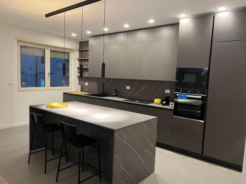 Kuchyň nebo kuchyňský kout v ubytování Glem Home