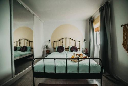 En eller flere senge i et værelse på Casa Ola Tu hogar en Lanzarote