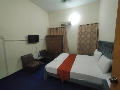 Ένα ή περισσότερα κρεβάτια σε δωμάτιο στο Peridot Cottage