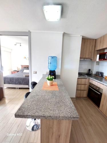 a kitchen with a counter top in a room at Departamento Centro Vista al mar 1D 1B in Antofagasta