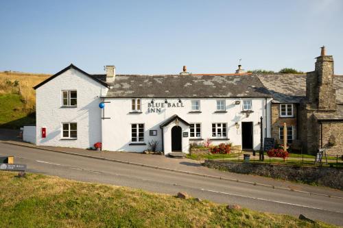 a white building on the side of a road at Blue Ball Inn in Lynmouth