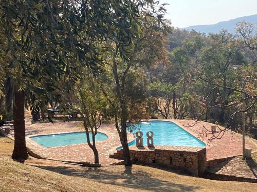 Πισίνα στο ή κοντά στο Tshiamo Bush Chalet