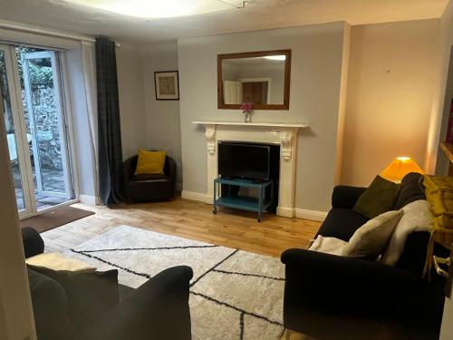 Ein Sitzbereich in der Unterkunft Spacious one bed apartment in the centre of Bray