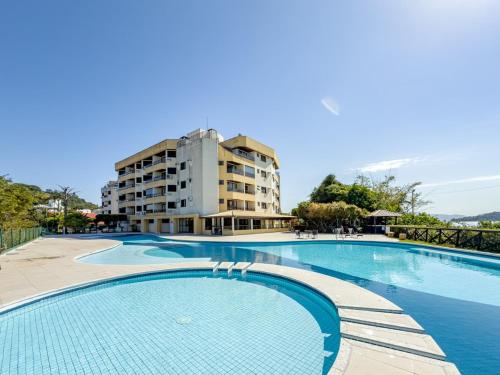 C103 Apartamento com vista lateral para o mar