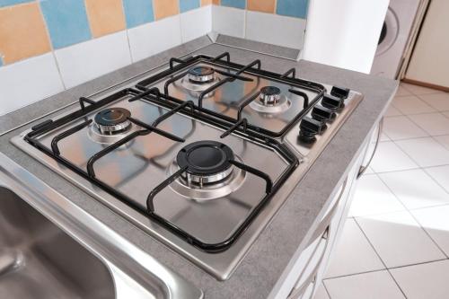 Dapur atau dapur kecil di Poolside escape in Rosolina-Beahost