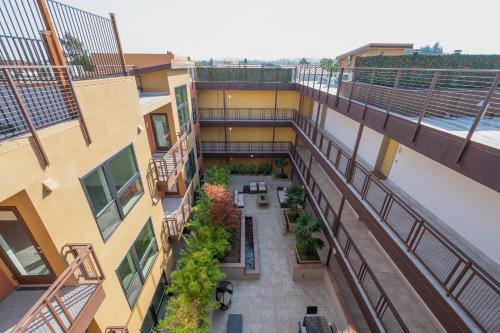 an overhead view of an apartment building with a courtyard at Elevator-Work Here-Gig WiFi-King Bed-Laundry in unit in Walnut Creek