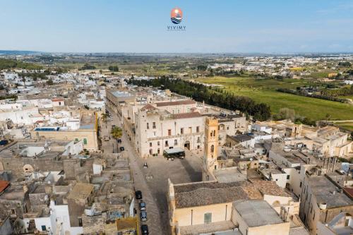 an aerial view of a city with buildings at Piazzetta San Giovanni Specchia in Specchia